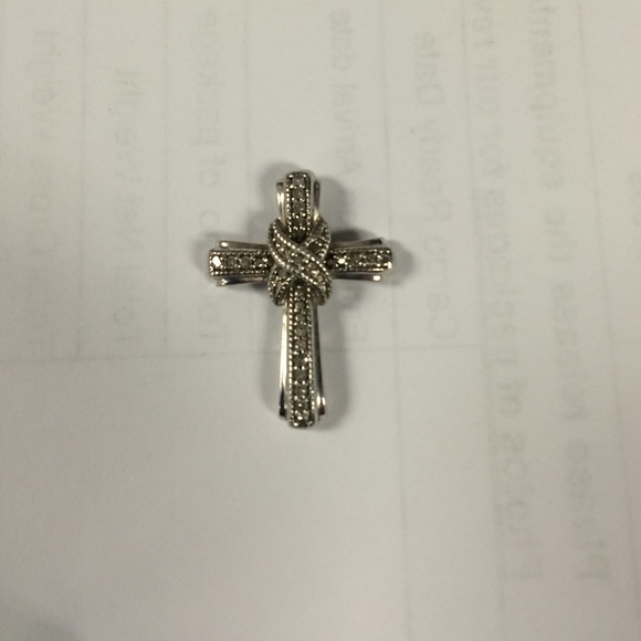 Diamond cross pendant.
