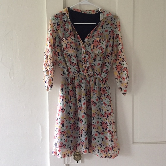 Floral quarter length sleeve spring dress.