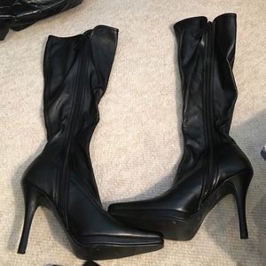 Tall heeled boots