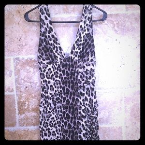 Animal print tight dress.