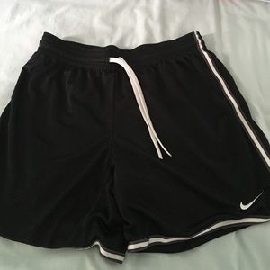 Nike dark blueish-black shorts size m-l