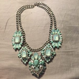 And beautiful teal colored necklace