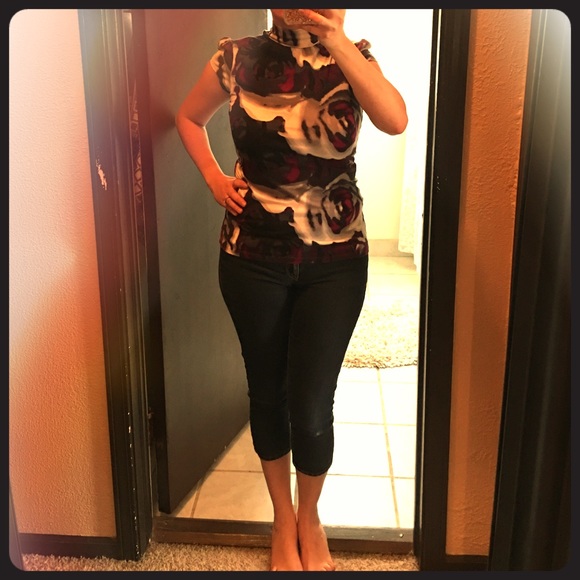 Express high neck form fitting top.