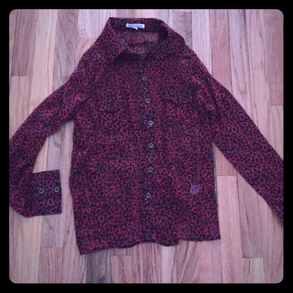 Sheer blouse with heart details. Worn once!