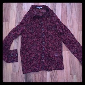 Sheer blouse with heart details. Worn once!