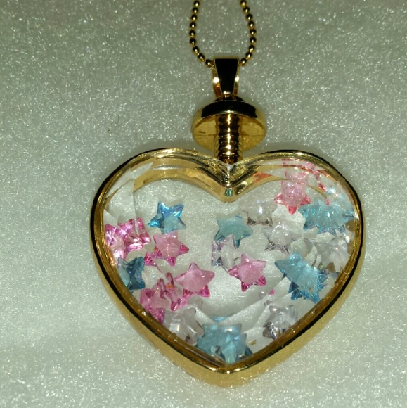 ?Crystal glass necklace filled with star crystals