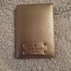 Brand new rose gold Kate Spade passport holder