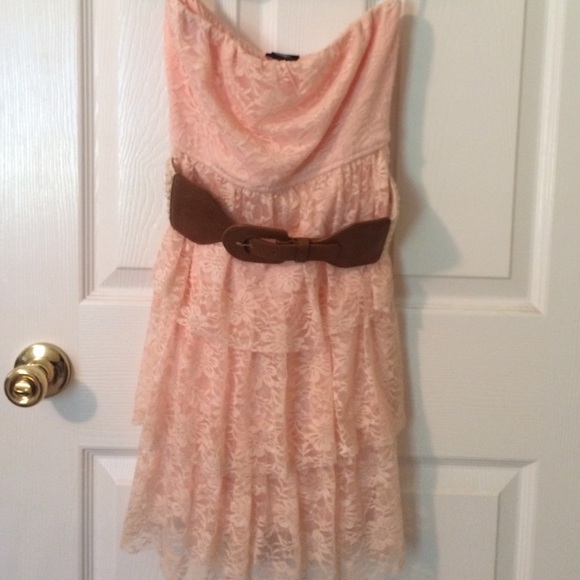 Pink ruffle dress with lace belt