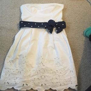 White dress with navy bow