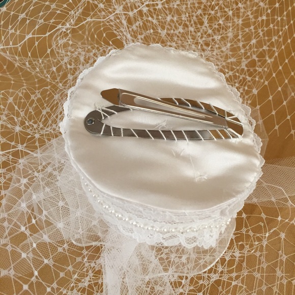 Custom white wedding bridal veil fascinator hat.