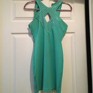 turquoise dress with silver gems on top