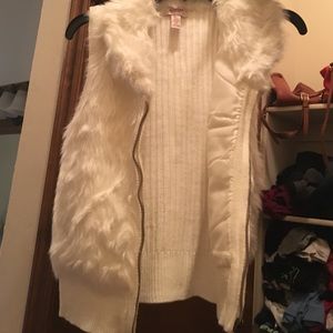 White fur vest