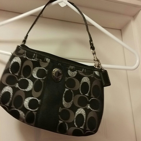 Black coach wristlet.