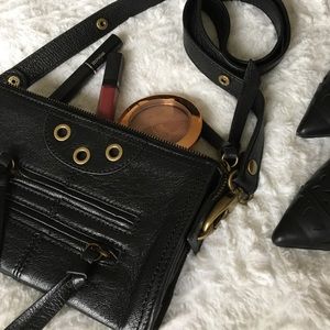 Black leather clutch with strap