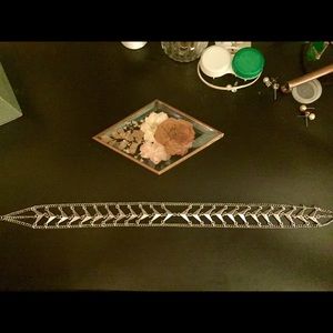 Silver adjustable choker.