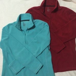 Two GAP quarter-zip fleece pullovers.
