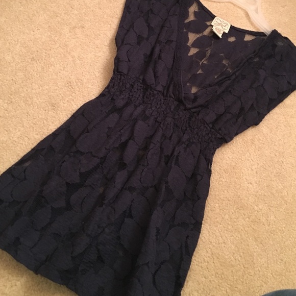 Eyelash couture. Lace like navy top.