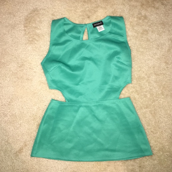 Tempted Jade cut out peplum top