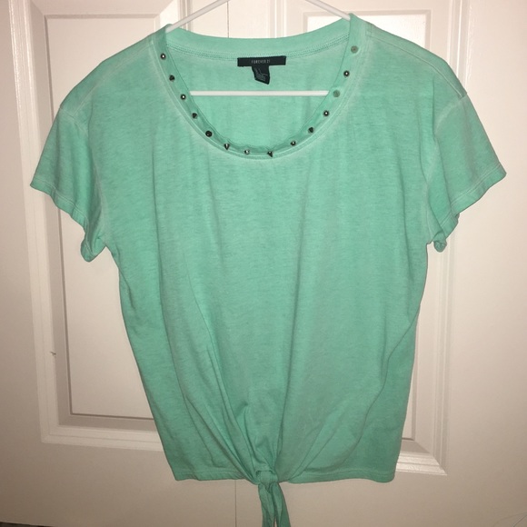 Cute TEAL t-shirt with silver studded neckline!