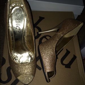Gold open toe pumps