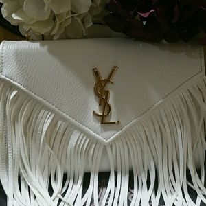 Saint Laurent's Monogram Envelope leather fringes