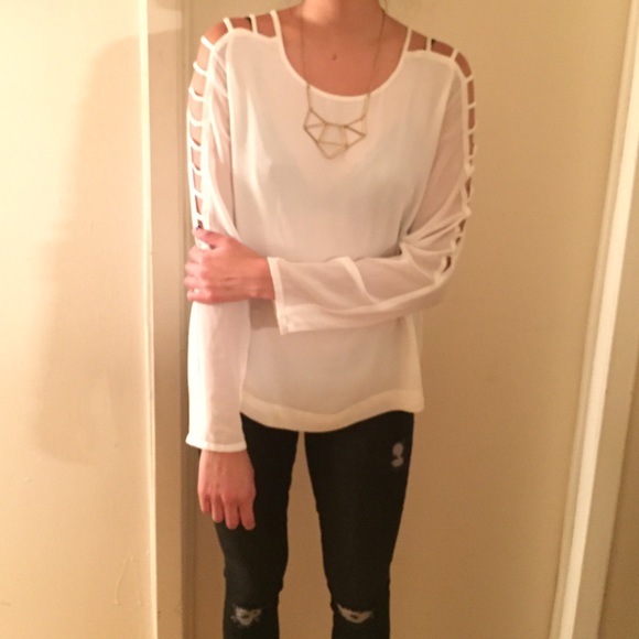 Edgy Akira sheer blouse with sleeve cutouts