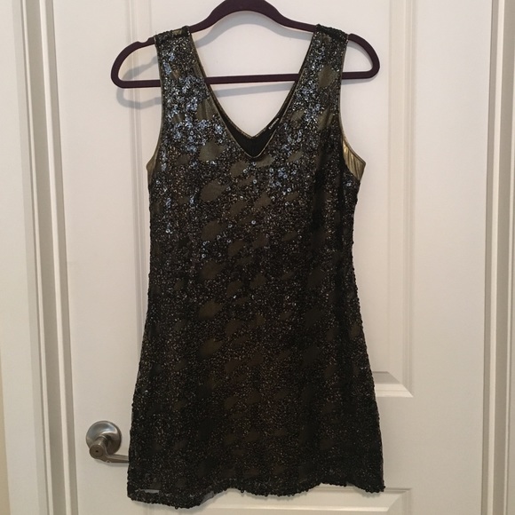 Black and gold sequin dress