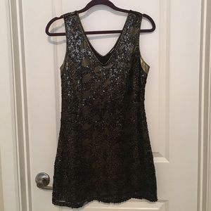 Black and gold sequin dress