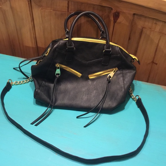 Black with neon green zippers Steve Madden purse