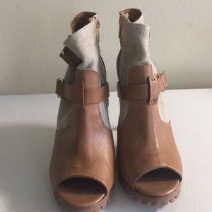 Used Tory Burch sandalwood peep toe booties.