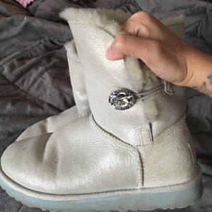 White shiny UGG Bailey button boots