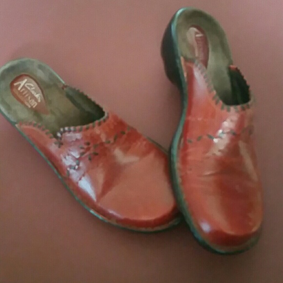 Gently worn Burgandy mules.