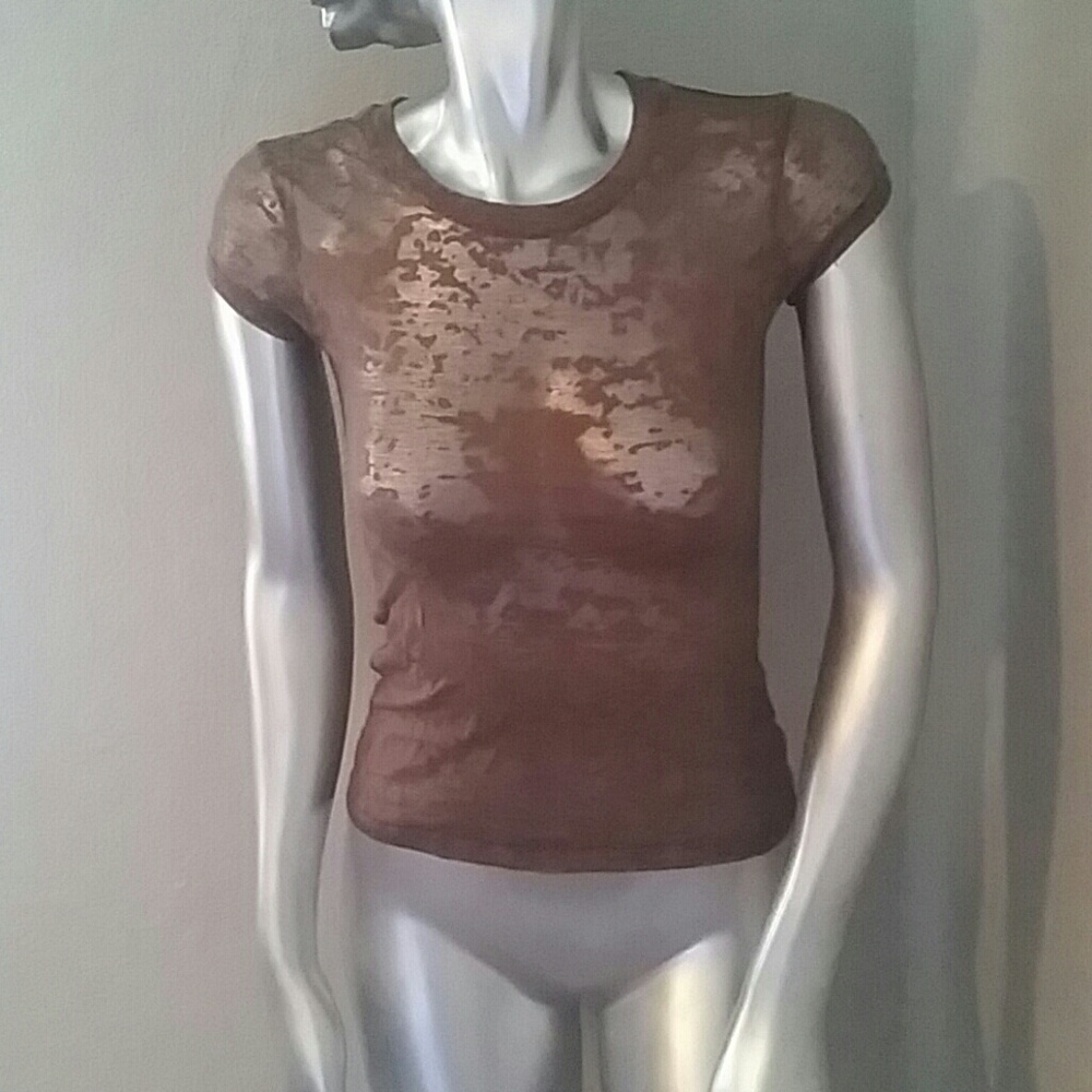 See thru splatter brown shirt. Very small.