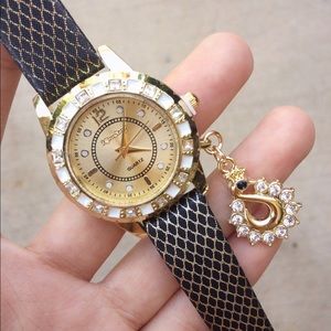 Quartz black and gold watch