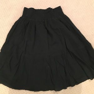 Boutique Black  skirt with cinghed waist.