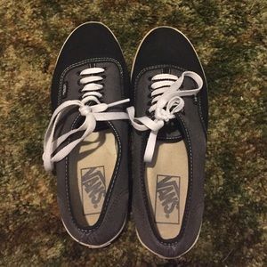 Black and grey vans