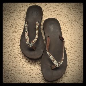 Brown reef flip flops