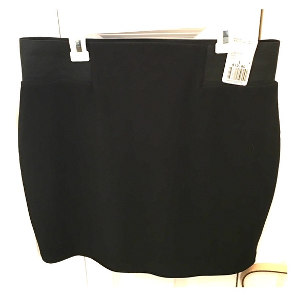 Black mini skirt. Above the knee