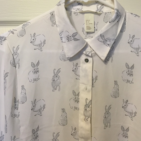 Adorably cute bunny print button front shirt.