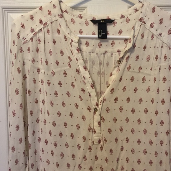 Soft white tunic top with dark rose floral print