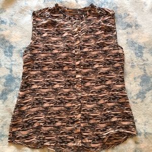 Sleeveless button down w/ beaded mandarin collar.