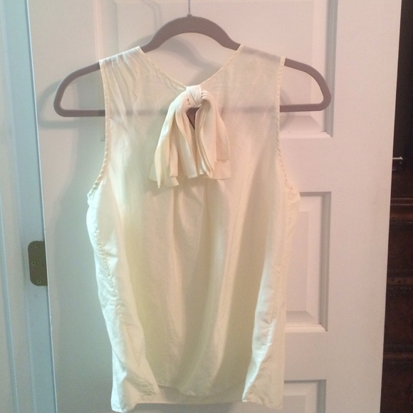 Cream silk top by Juicy Couture.