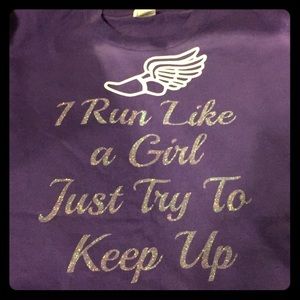 Workout shirt with pink glitter writing.