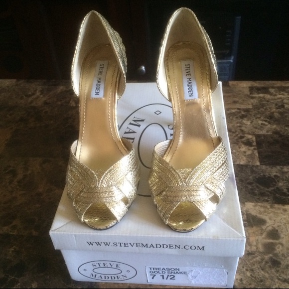 Gold snakeskin shoes by Steve Madden