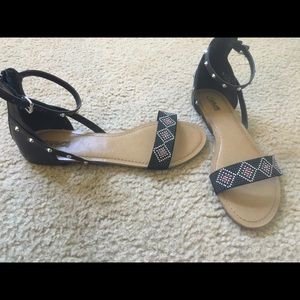 Carlos Santana sandals