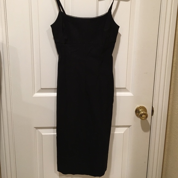 Simple black dress by Guess. Zipper in the back