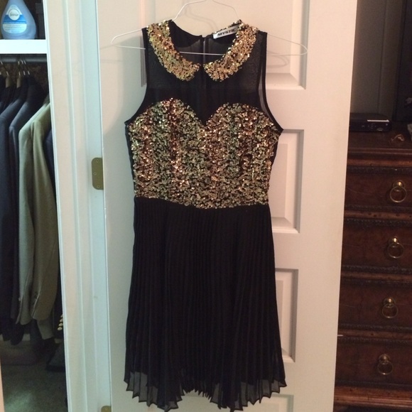 Black and gold sequin dress