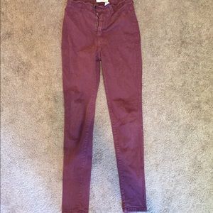 VIBRANT maroon high waisted jeans.