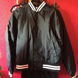 Black windbreaker