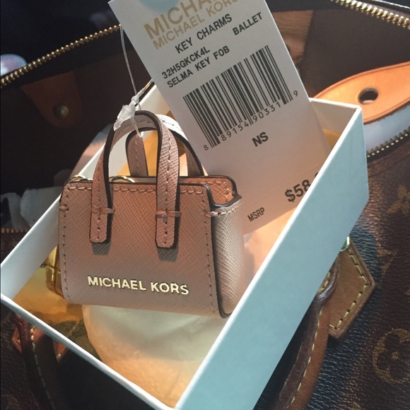 Michael Kors pink key chain holder.
